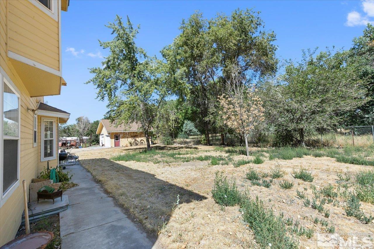 5790 Hooper Place Fallon, NV 89406 - Photo 7 of 39 a view of a yard and front view of a house