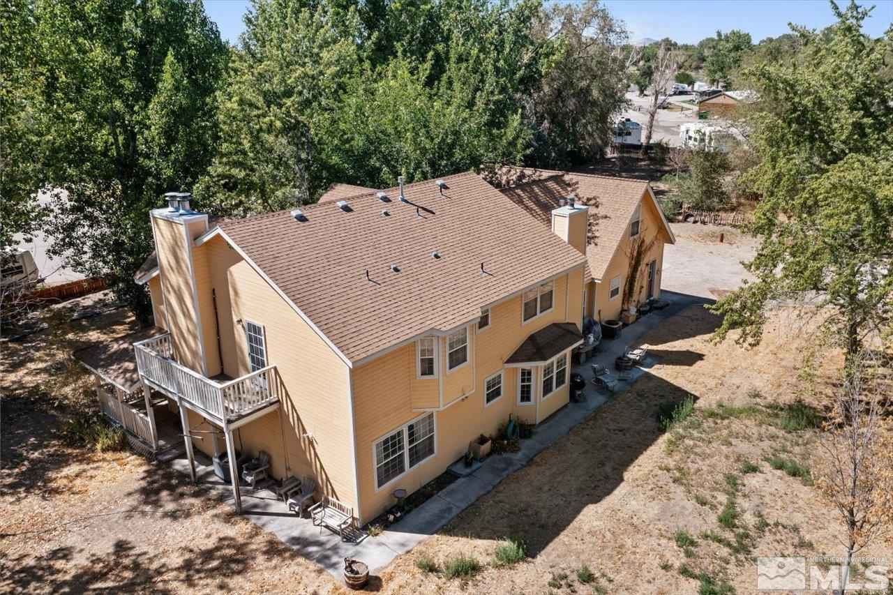 5790 Hooper Place Fallon, NV 89406 - Photo 10 of 39 an aerial view of a house with yard and outdoor seating