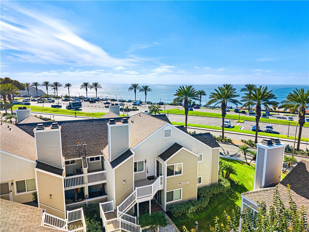 34002 Selva Road, Unit 369 Dana Point, CA 92629 - Photo 24 of 31 a view of a swimming pool with an outdoor seating