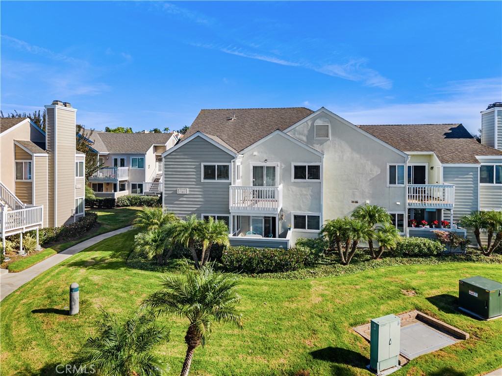 34002 Selva Road, Unit 369 Dana Point, CA 92629 - Photo 5 of 31 a front view of a house with a yard