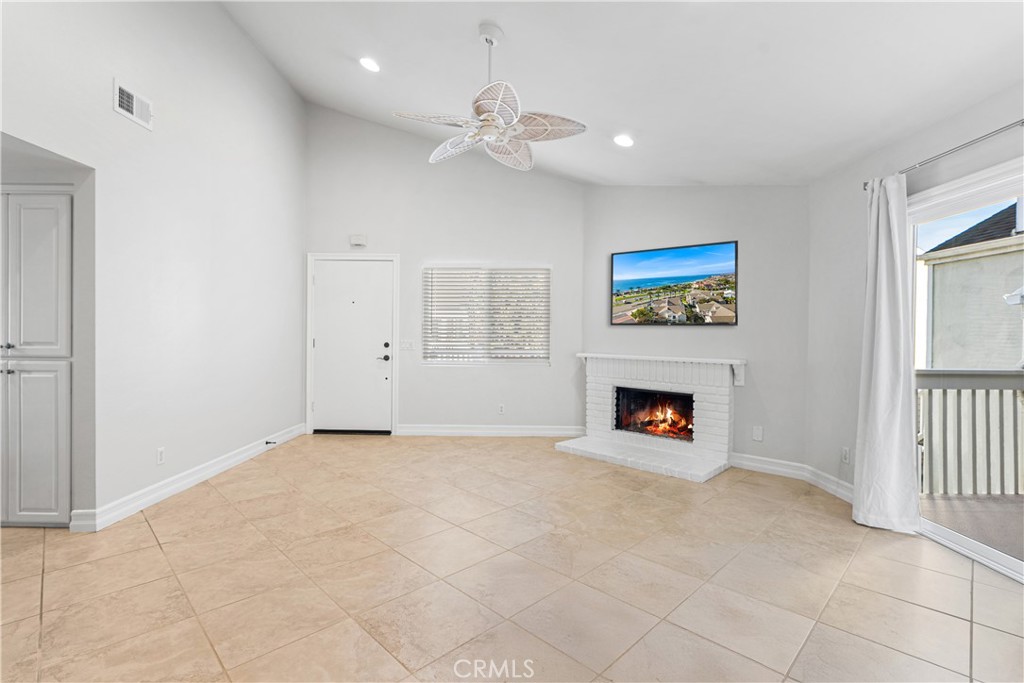 34002 Selva Road, Unit 369 Dana Point, CA 92629 - Photo 8 of 31 a view of an empty room with a window