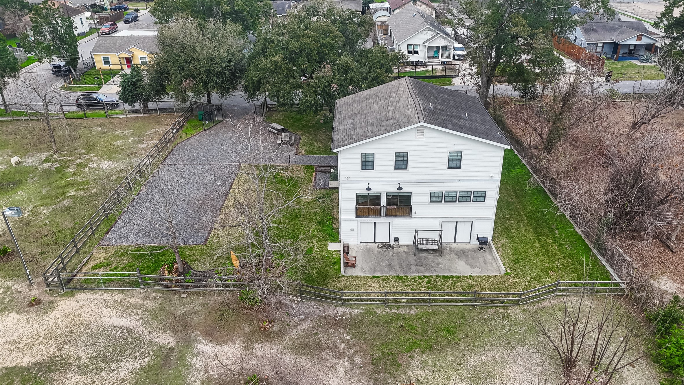 1808 Tabor Street Houston, TX 77009 - Photo 24 of 26 a aerial view of a house with a yard table and chairs