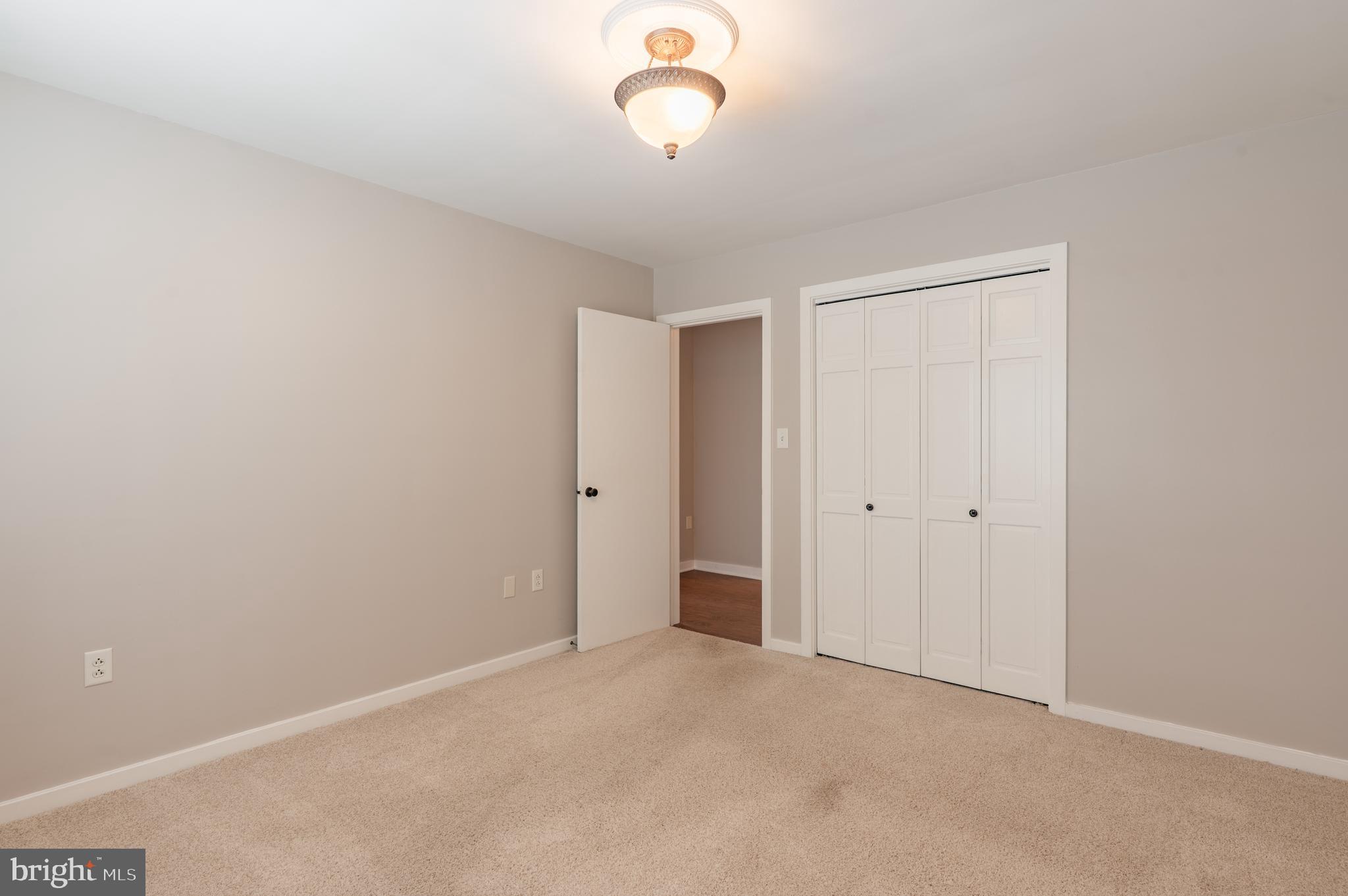 915 Cressman Road Harleysville, PA 19438 - Photo 18 of 39 a view of an empty room and a window