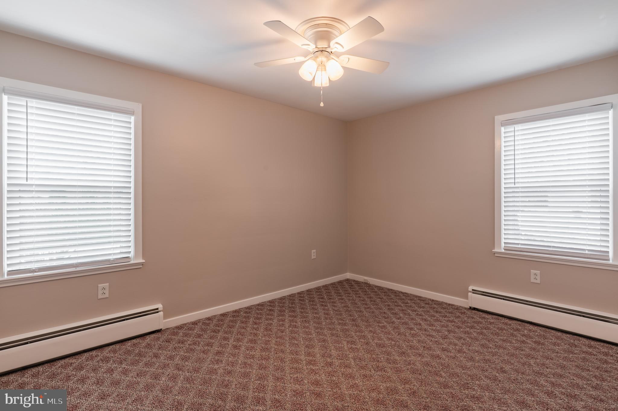 915 Cressman Road Harleysville, PA 19438 - Photo 22 of 39 a view of an empty room with a window
