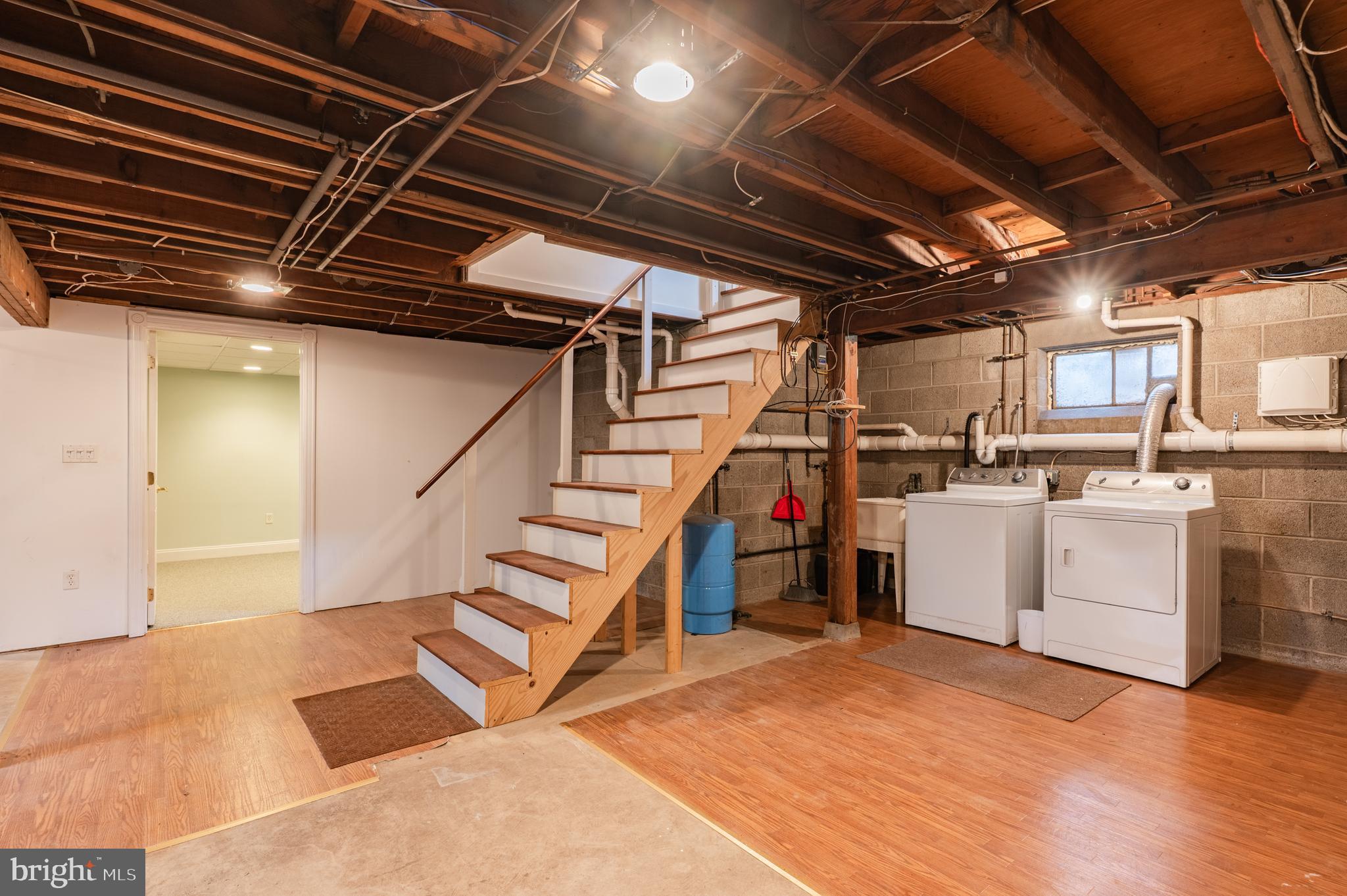 915 Cressman Road Harleysville, PA 19438 - Photo 29 of 39 a view of storage and utility room with stairs