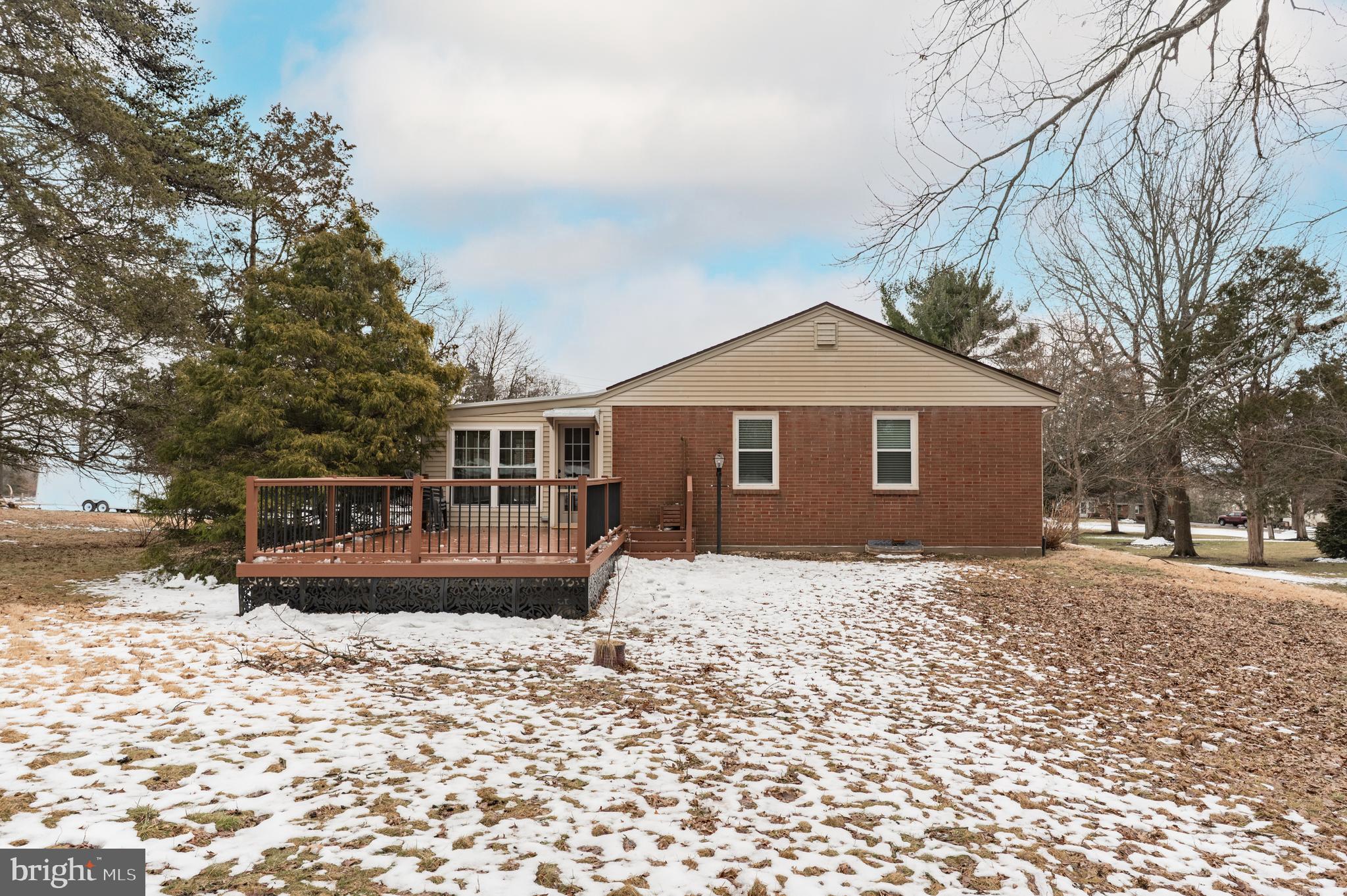 915 Cressman Road Harleysville, PA 19438 - Photo 31 of 39 a front view of a house with a yard covered in snow