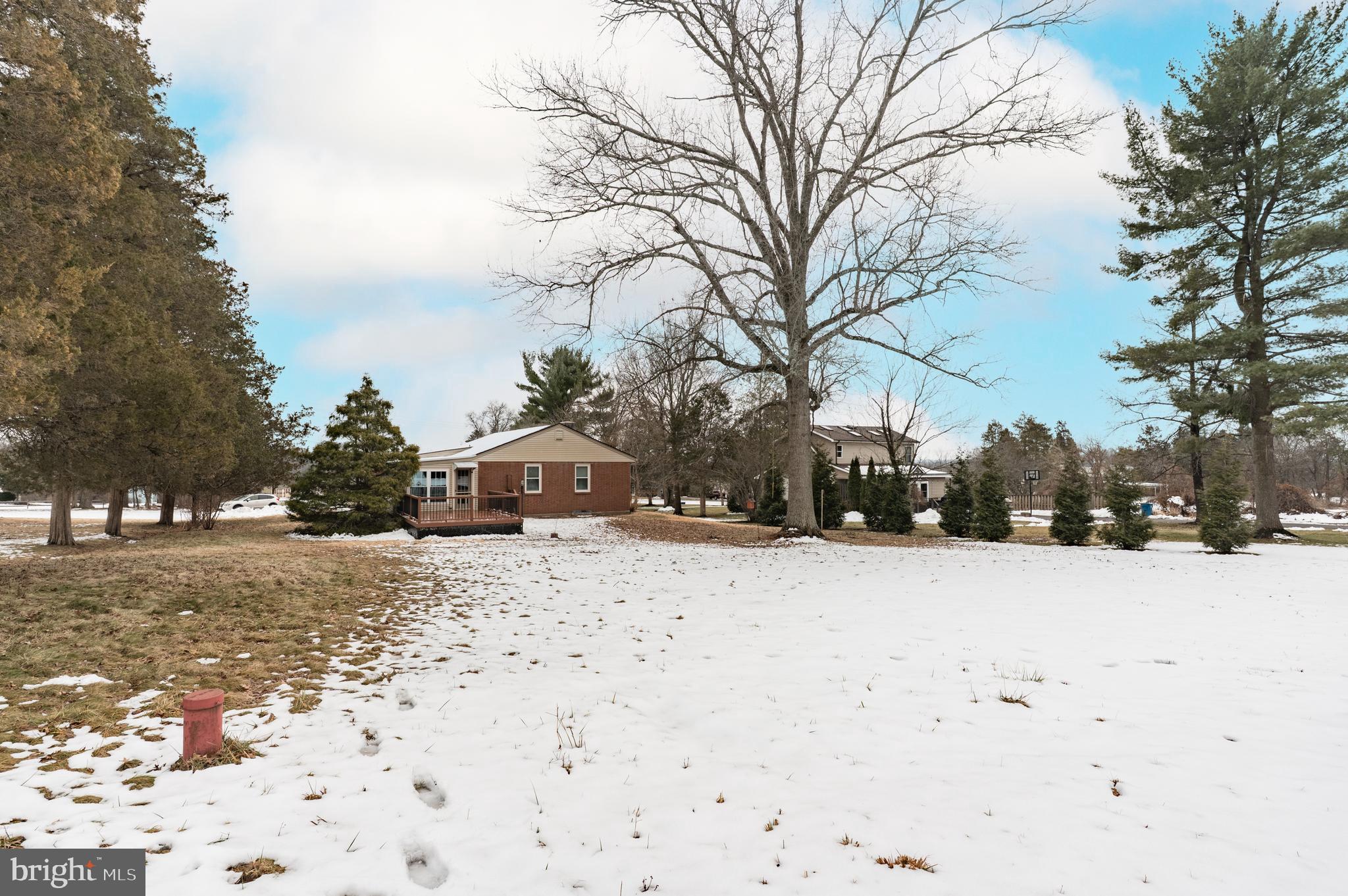 915 Cressman Road Harleysville, PA 19438 - Photo 37 of 39 a street view covered with snow