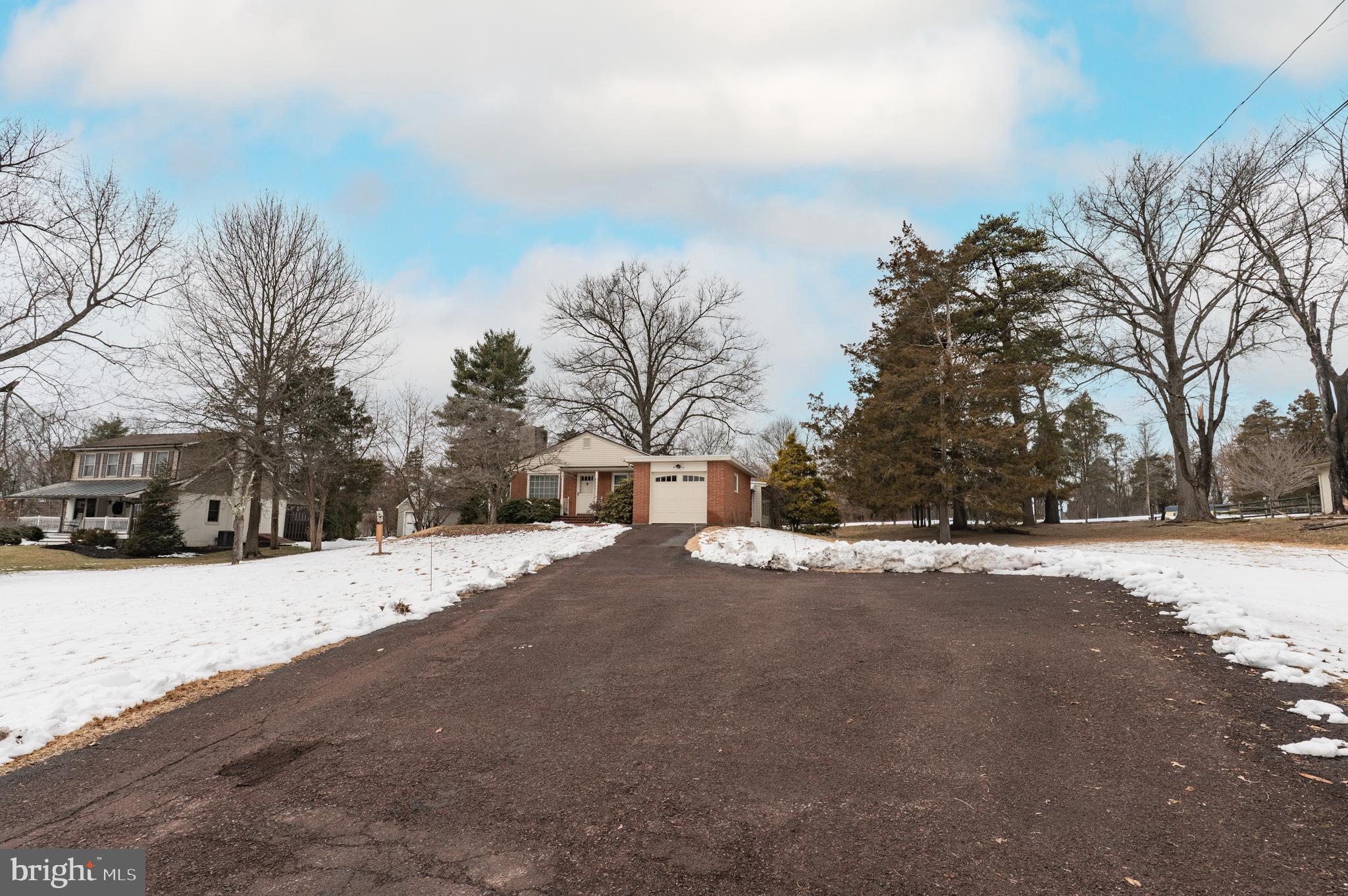 915 Cressman Road Harleysville, PA 19438 - Photo 39 of 39 a street view of snow with trees