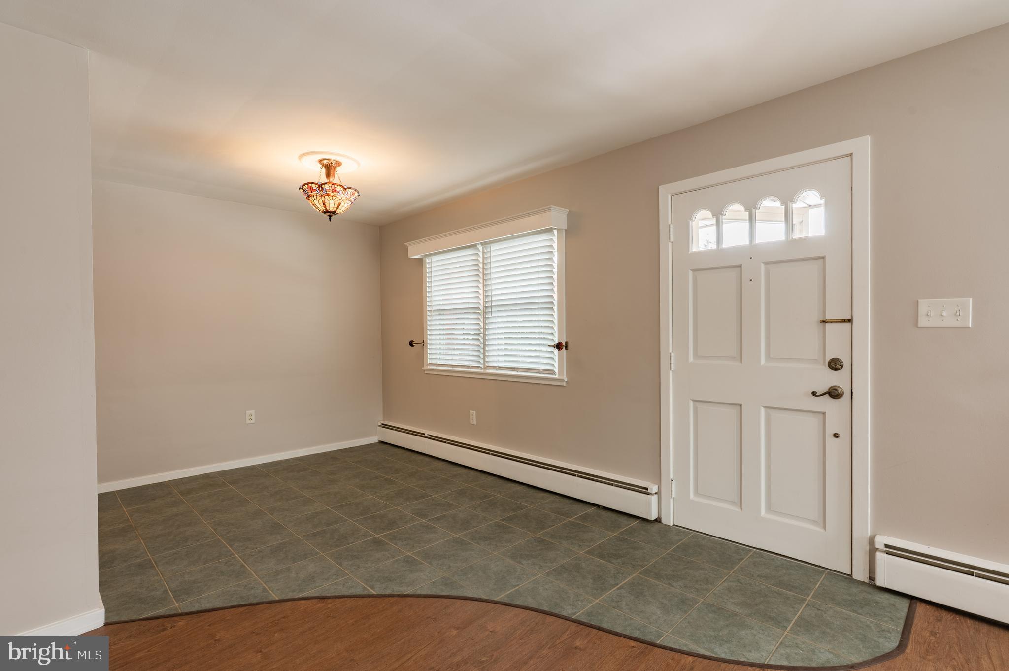 915 Cressman Road Harleysville, PA 19438 - Photo 7 of 39 an empty room with windows and closet