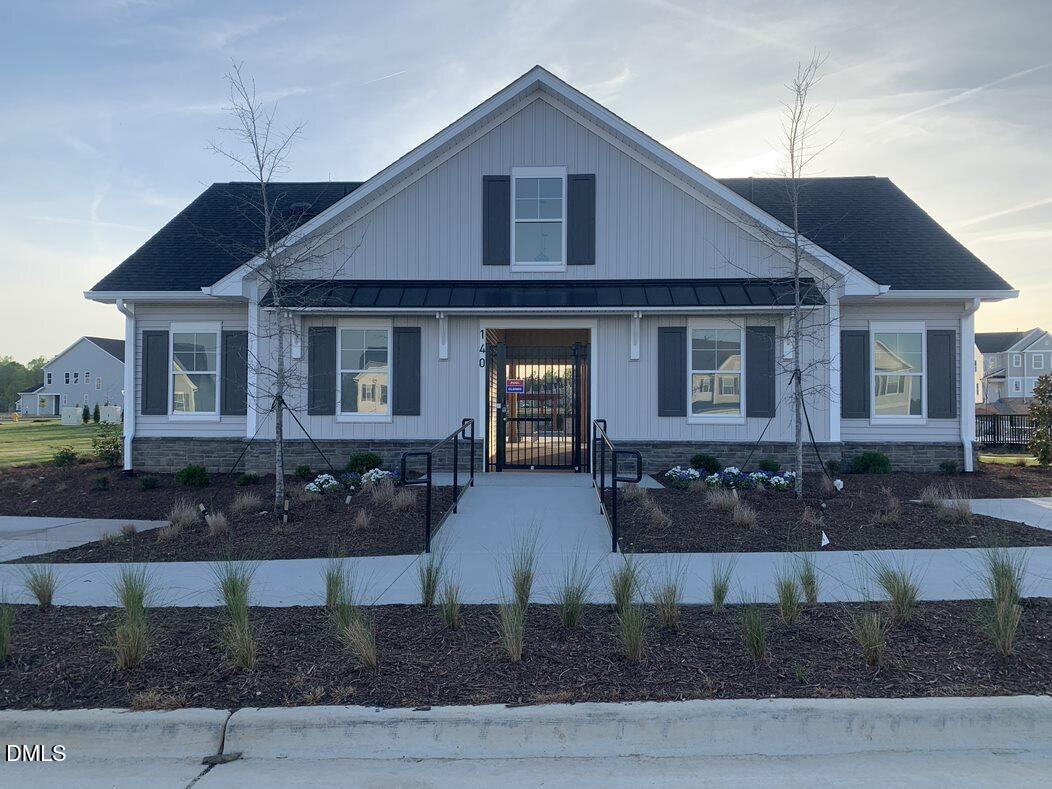 303 Aster Bloom Lane Raleigh, NC 27610 - Photo 16 of 21 clubhouse front