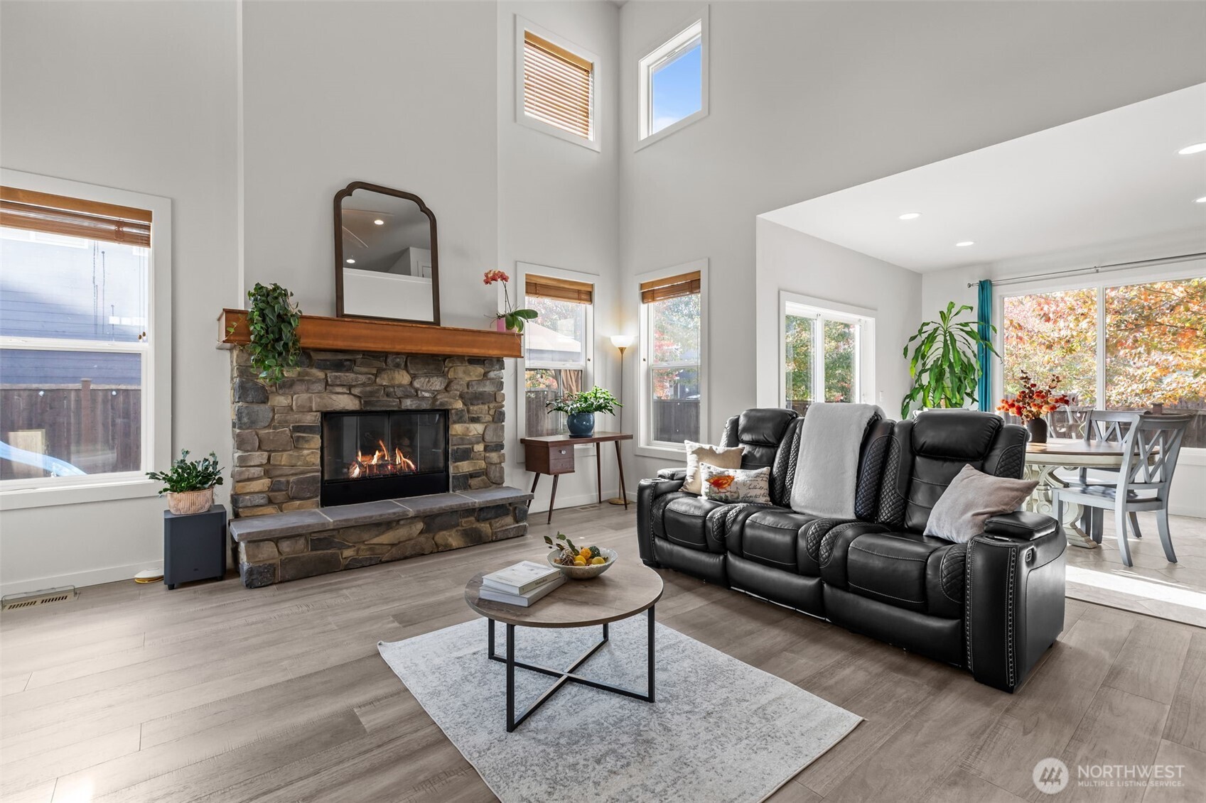 33303 Northeast 42nd Street Carnation, WA 98014 - Photo 16 of 39 a living room with furniture and a fireplace