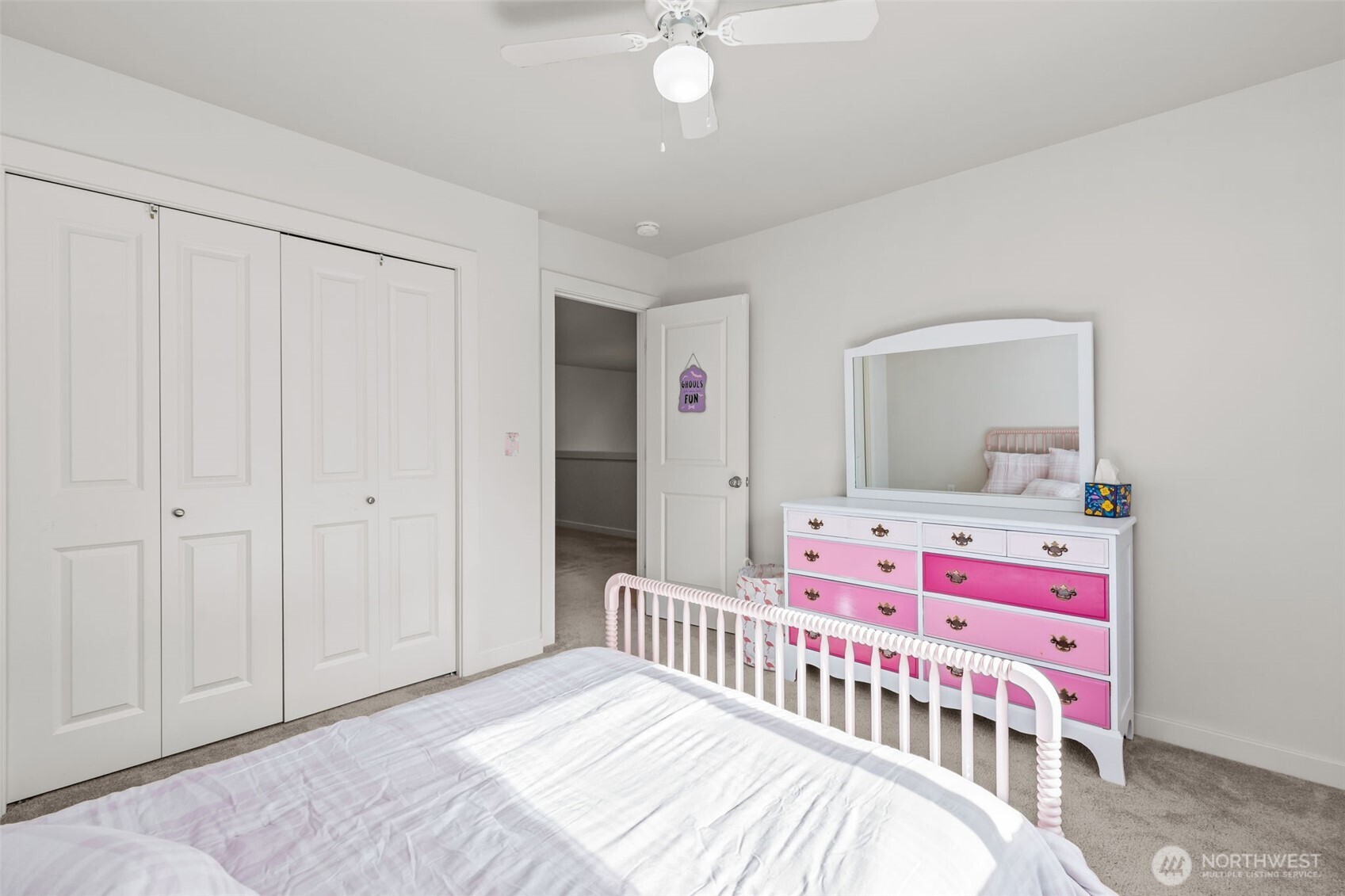 33303 Northeast 42nd Street Carnation, WA 98014 - Photo 27 of 39 a bedroom with a bed and wooden floor