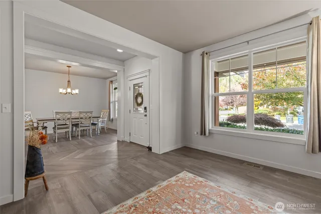 a view of a livingroom with furniture and window