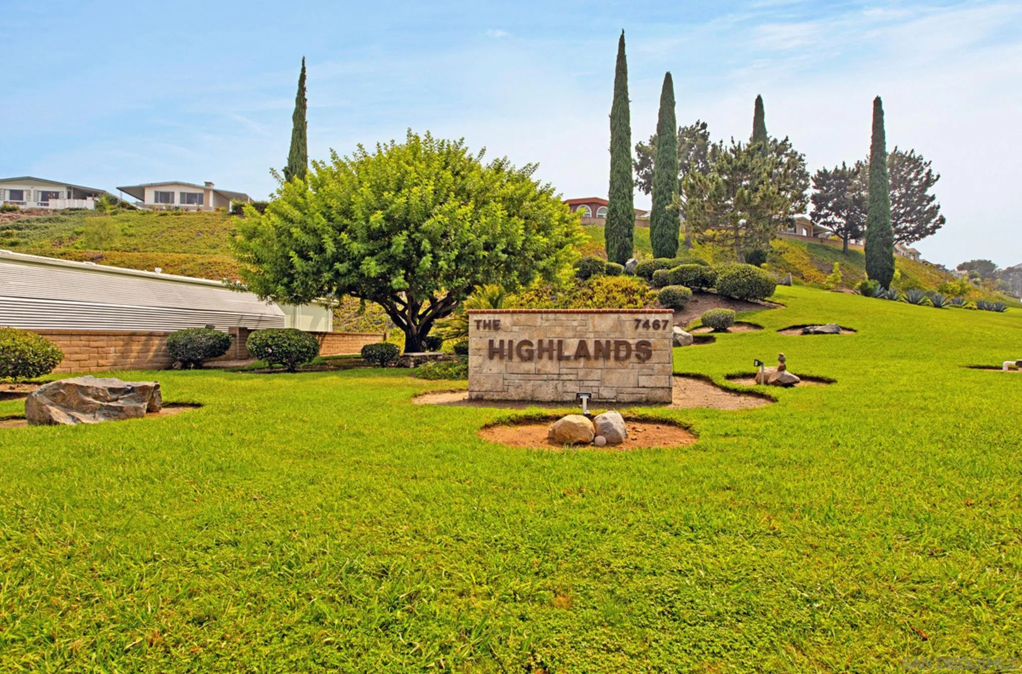 7467 Mission Gorge Road, Unit 6 Santee, CA 92071 - Photo 13 of 14 a view of a house with a yard and sitting area