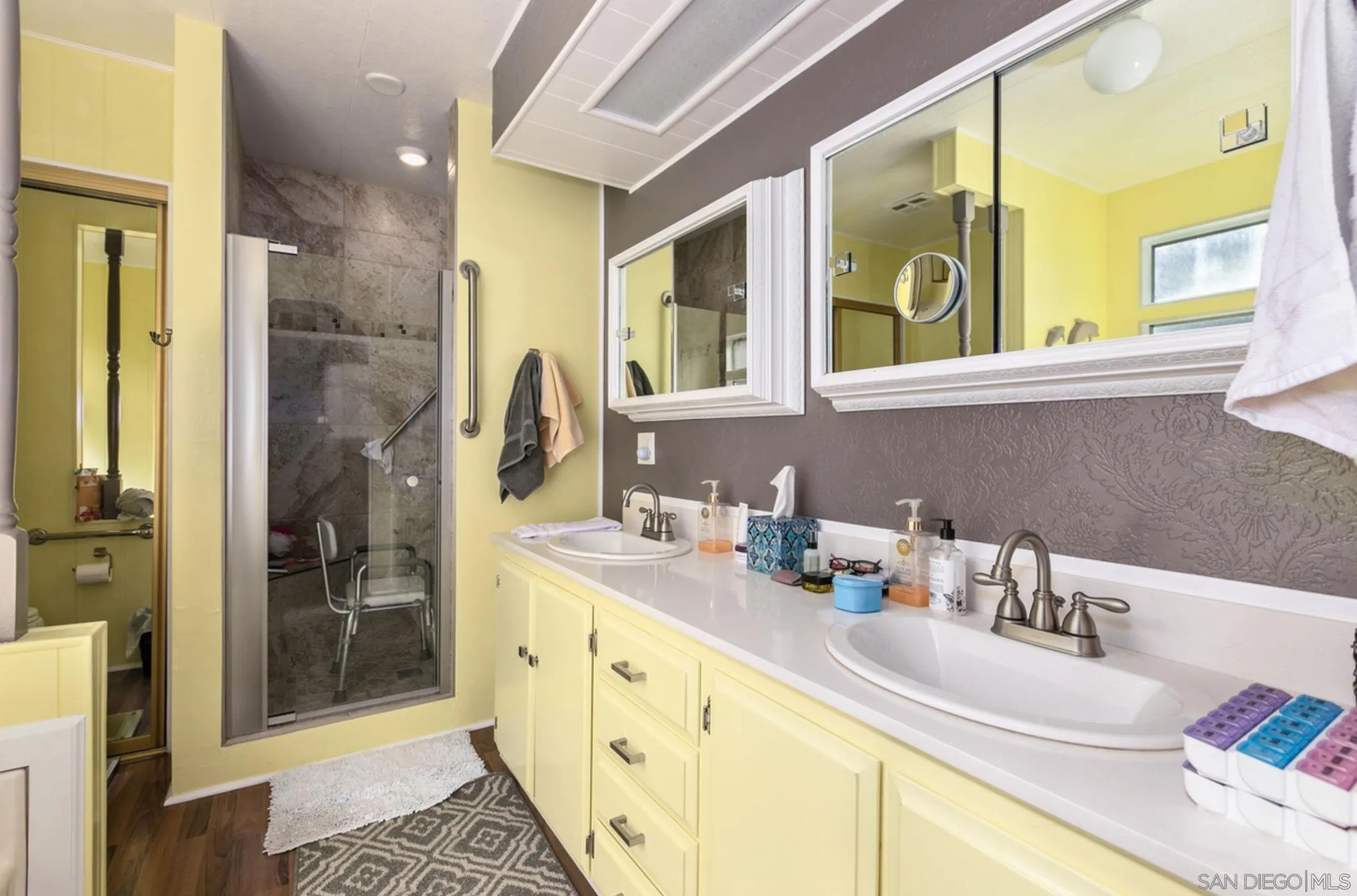 7467 Mission Gorge Road, Unit 6 Santee, CA 92071 - Photo 8 of 14 a bathroom with a sink and a mirror