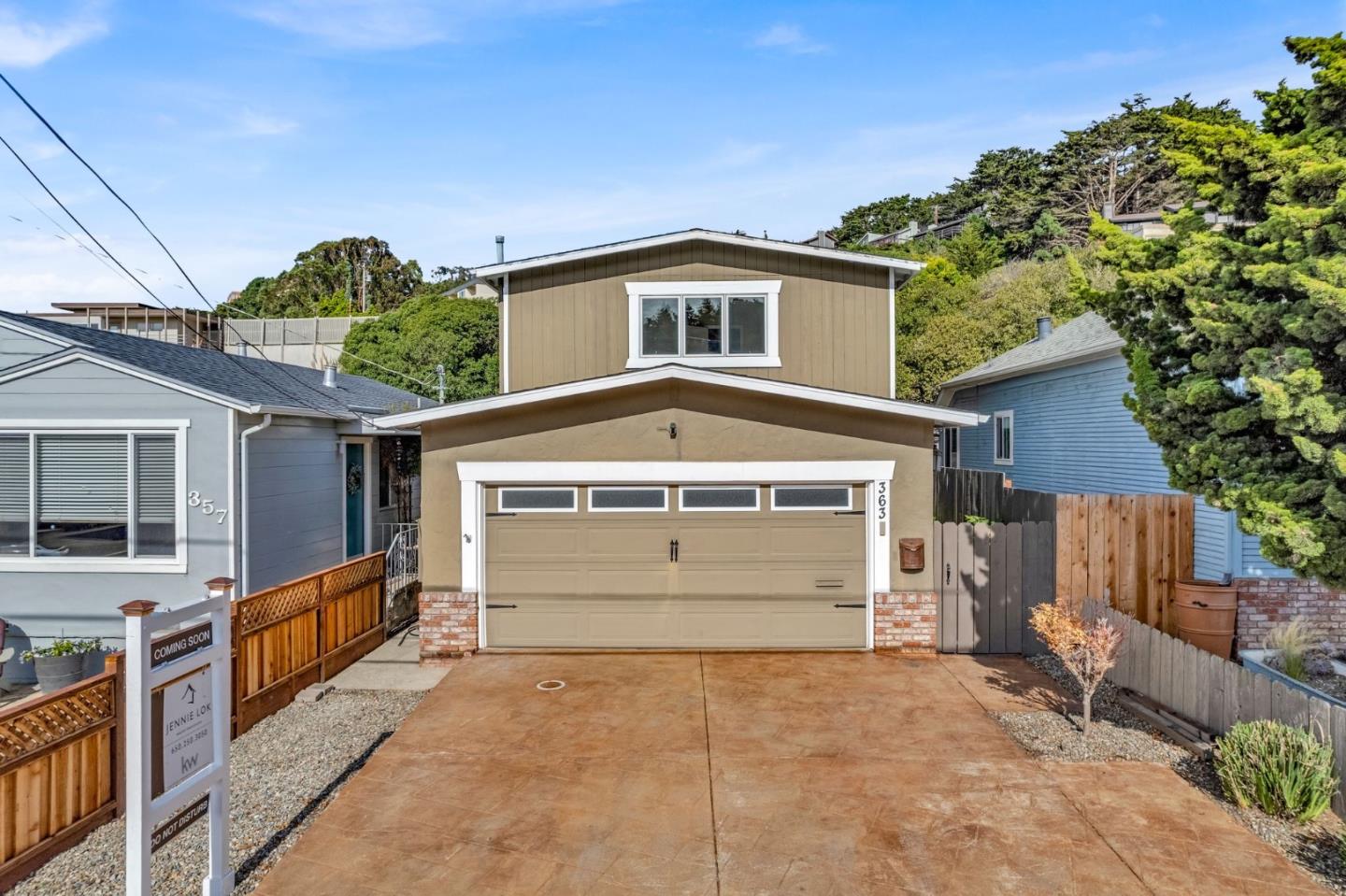 363 Pacific Avenue Pacifica, CA 94044 - Photo 1 of 70 a view of a house with a garage