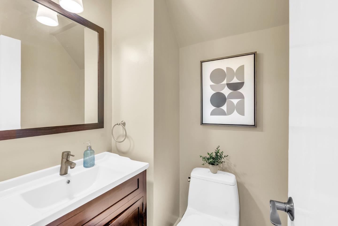 363 Pacific Avenue Pacifica, CA 94044 - Photo 21 of 70 a bathroom with a sink mirror and vanity