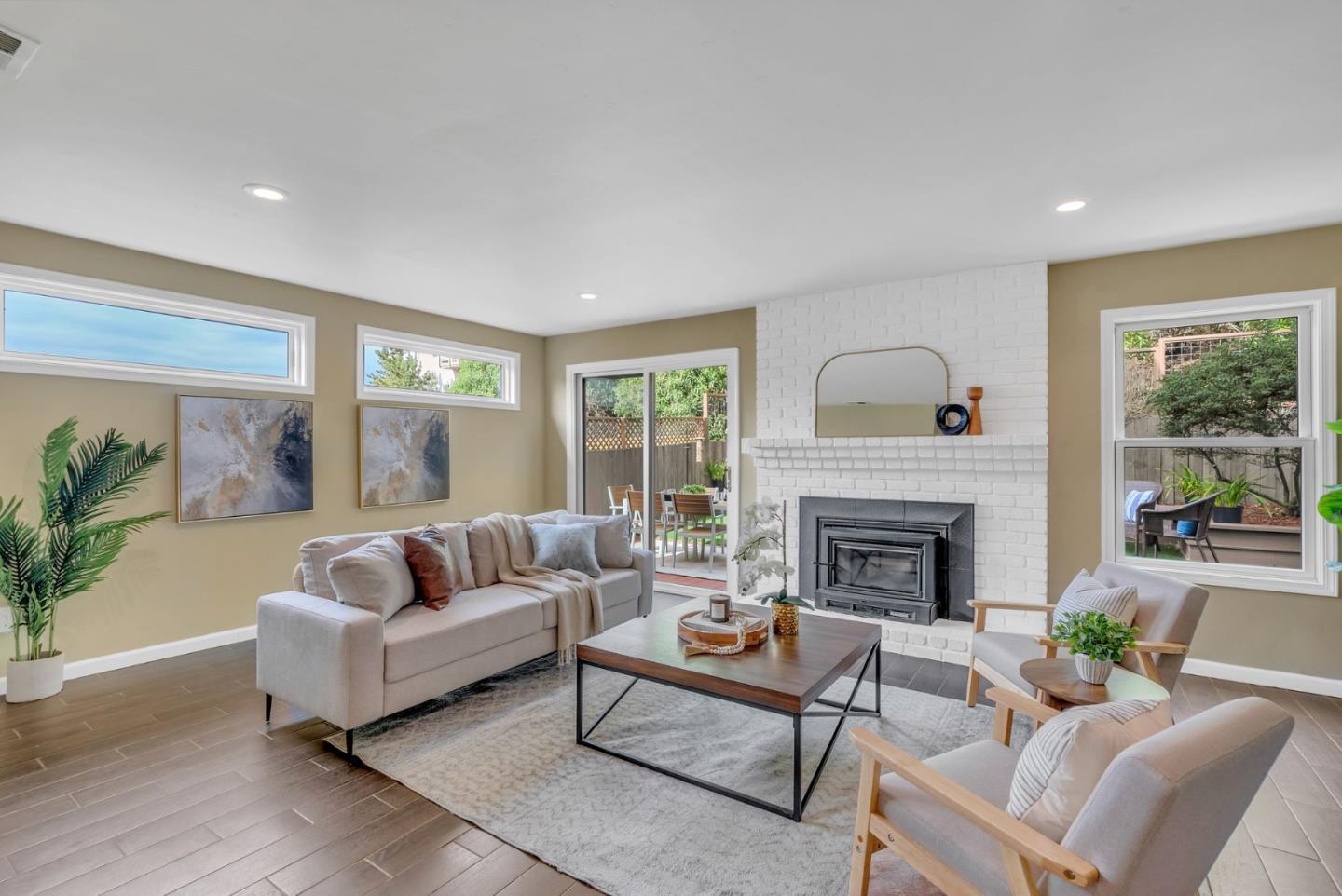 363 Pacific Avenue Pacifica, CA 94044 - Photo 4 of 70 a living room with furniture and a fireplace