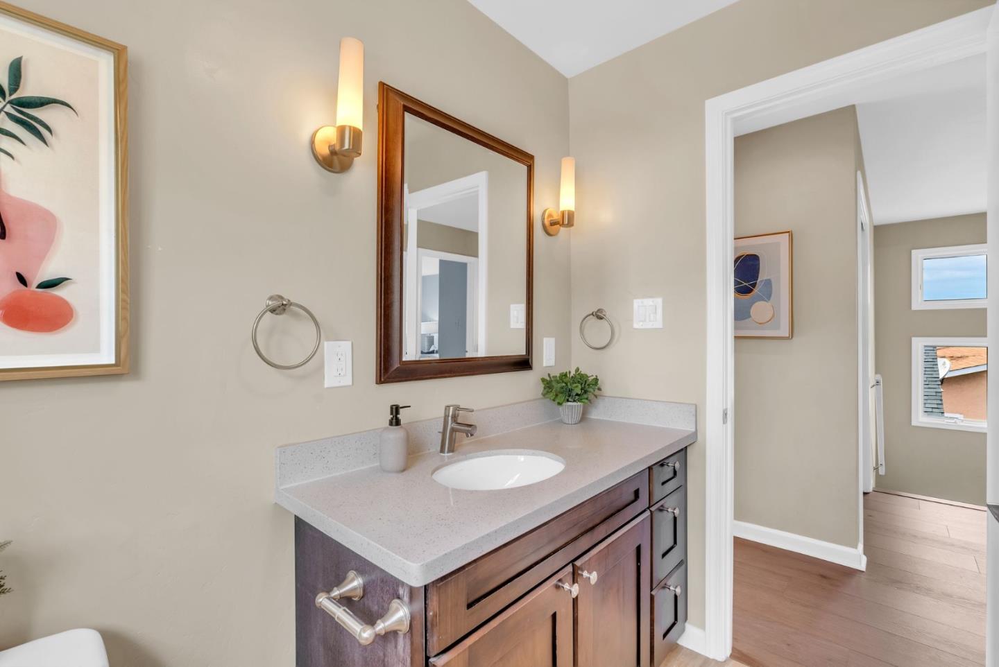 363 Pacific Avenue Pacifica, CA 94044 - Photo 42 of 70 a bathroom with a sink vanity and a mirror