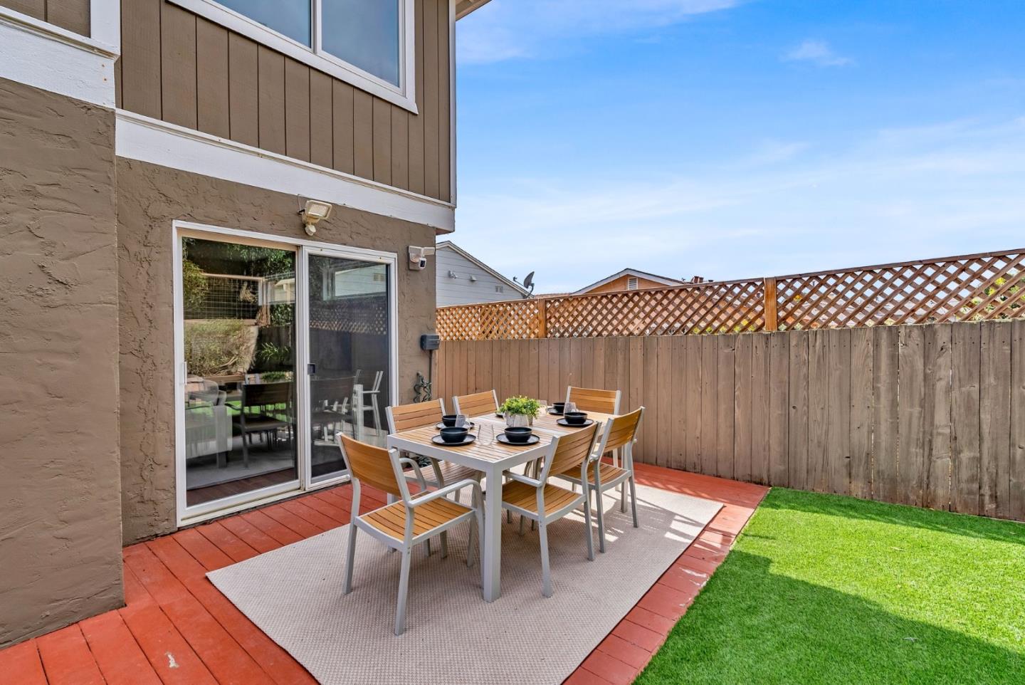 363 Pacific Avenue Pacifica, CA 94044 - Photo 49 of 70 a view of a backyard with a patio and outdoor seating