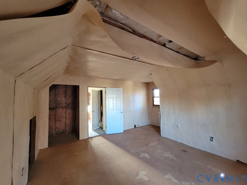 515 18th Street West Point, VA 23181 - Photo 18 of 23 a view of a hallway with wooden floor and staircase
