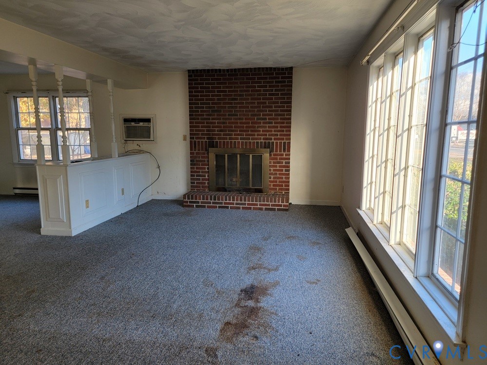 515 18th Street West Point, VA 23181 - Photo 5 of 23 a view of an empty room and window
