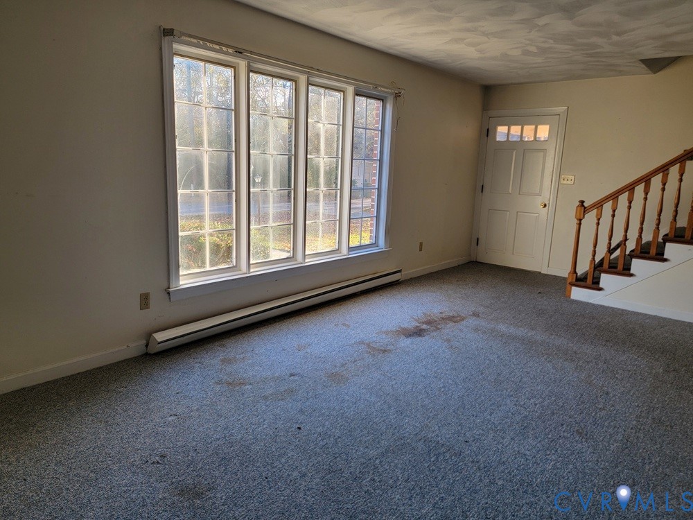 515 18th Street West Point, VA 23181 - Photo 6 of 23 an empty room with windows