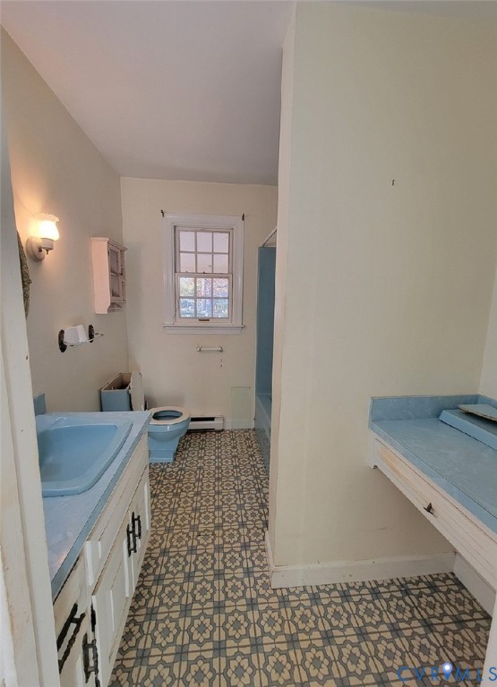 515 18th Street West Point, VA 23181 - Photo 9 of 23 a bathroom with a sink a vanity and a mirror