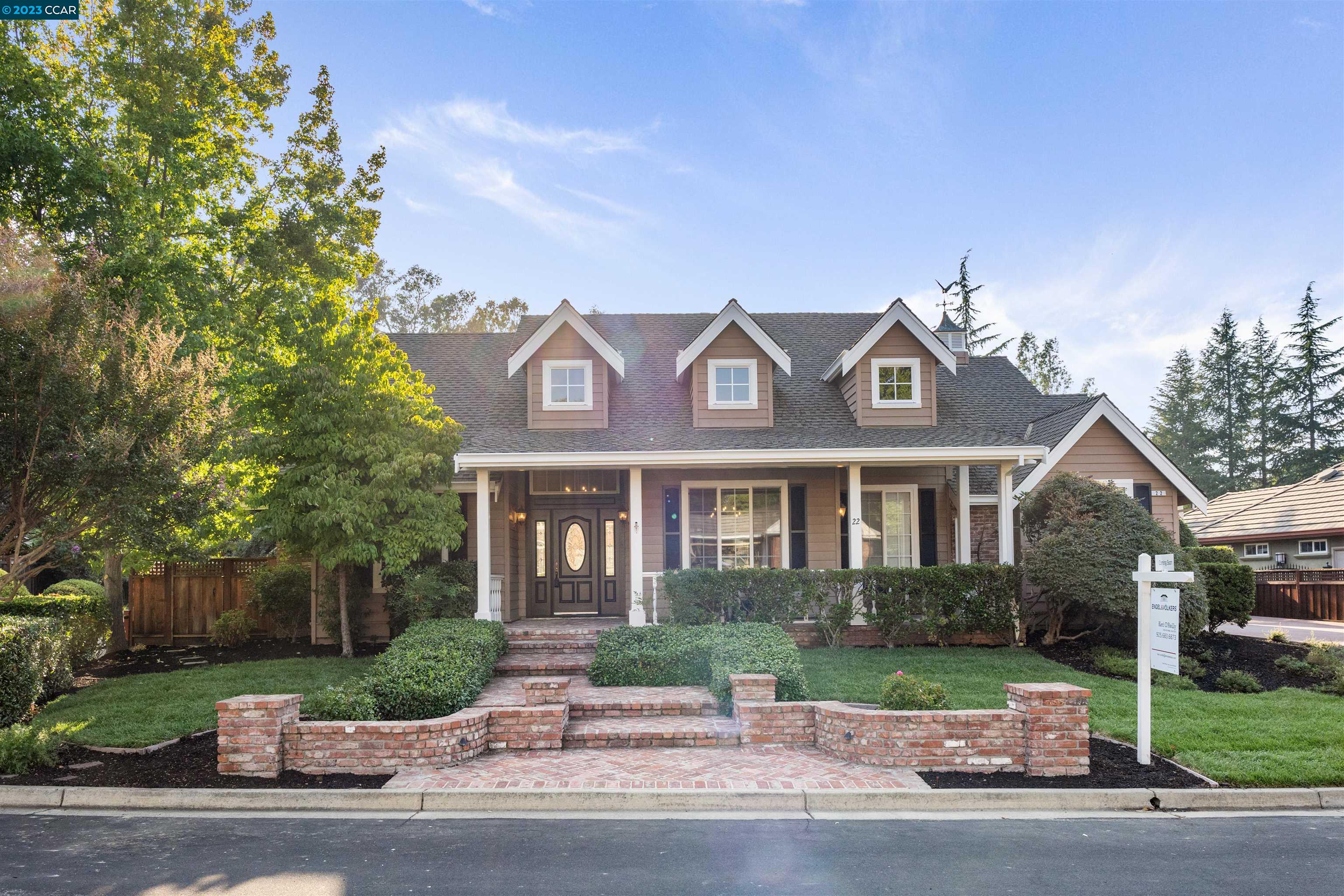 22 Woodside Drive Danville, CA 94506 - Photo 1 of 1 a front view of a house with a garden