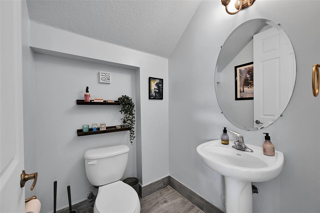 2851 Prospect Road, Unit 1202 Tamarac, FL 33309 - Photo 12 of 25 Guest half bath downstairs