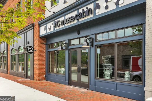 a street sign on a brick building