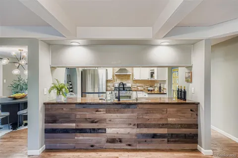 a view of living room with wooden floor