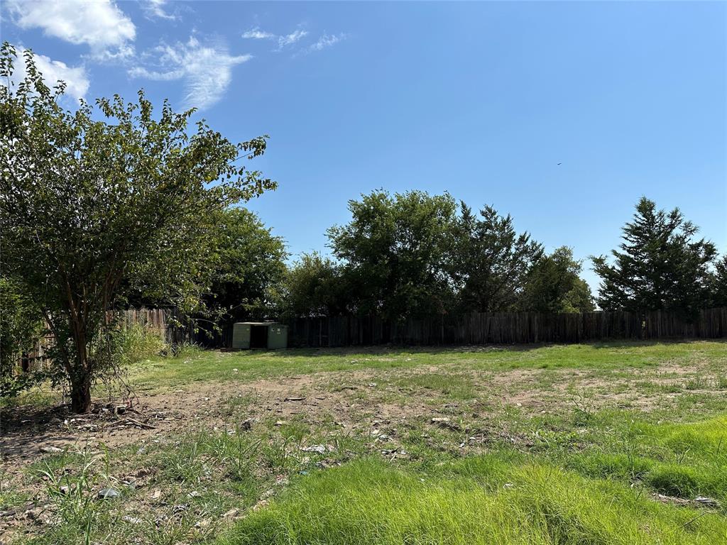 219 Hubbard Road Sunset, TX 76270 - Photo 17 of 18 a view of a green field