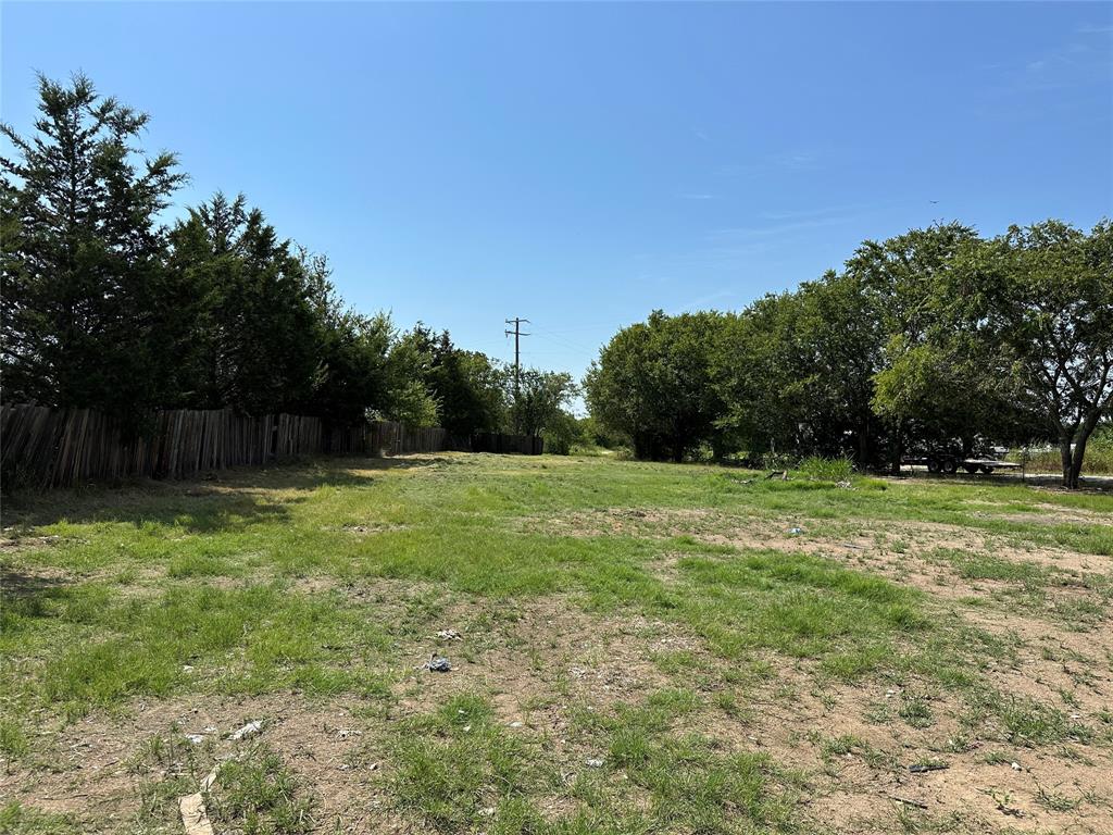 219 Hubbard Road Sunset, TX 76270 - Photo 8 of 18 a view of a backyard
