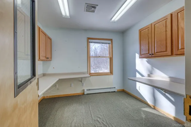 an empty room with windows