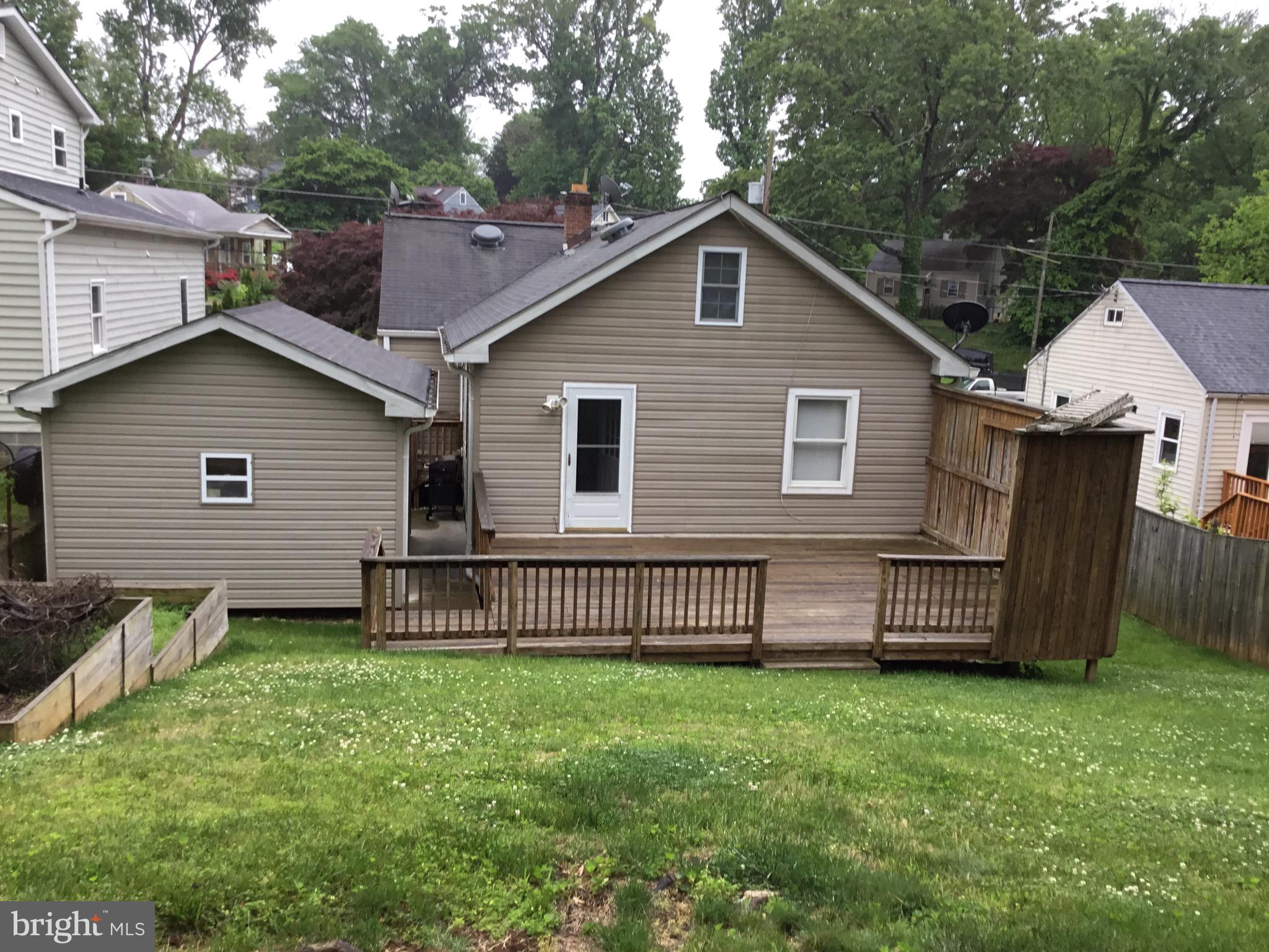 4315 Mahan Road Silver Spring, MD 20906 - Photo 54 of 76 a front view of a house with a garden