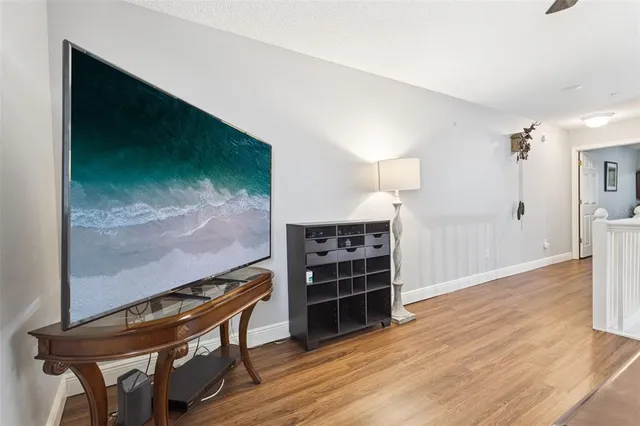 a view of a livingroom with furniture and wooden floor