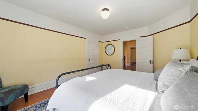 a bedroom with a bed and a walk in closet