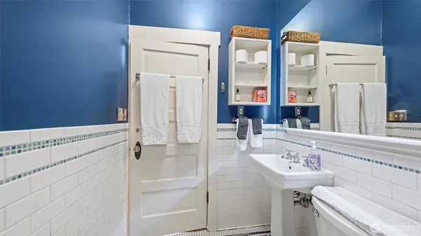 a kitchen with stainless steel appliances a refrigerator and a stove