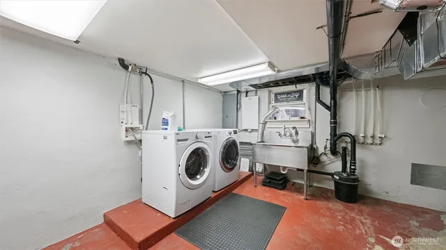 a view of a house with a backyard and sitting area