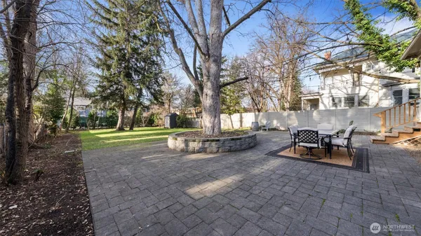 a backyard of a house with lots of green space
