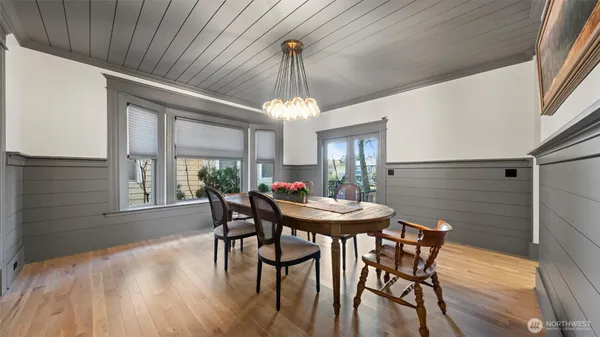 a view of a dining room with furniture window and outside view