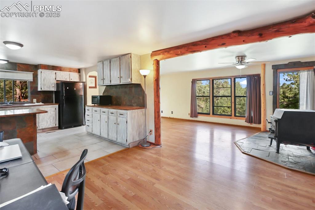 410 Rangeview Road Divide, CO 80814 - Photo 8 of 23 a view of a livingroom with furniture wooden floor and window