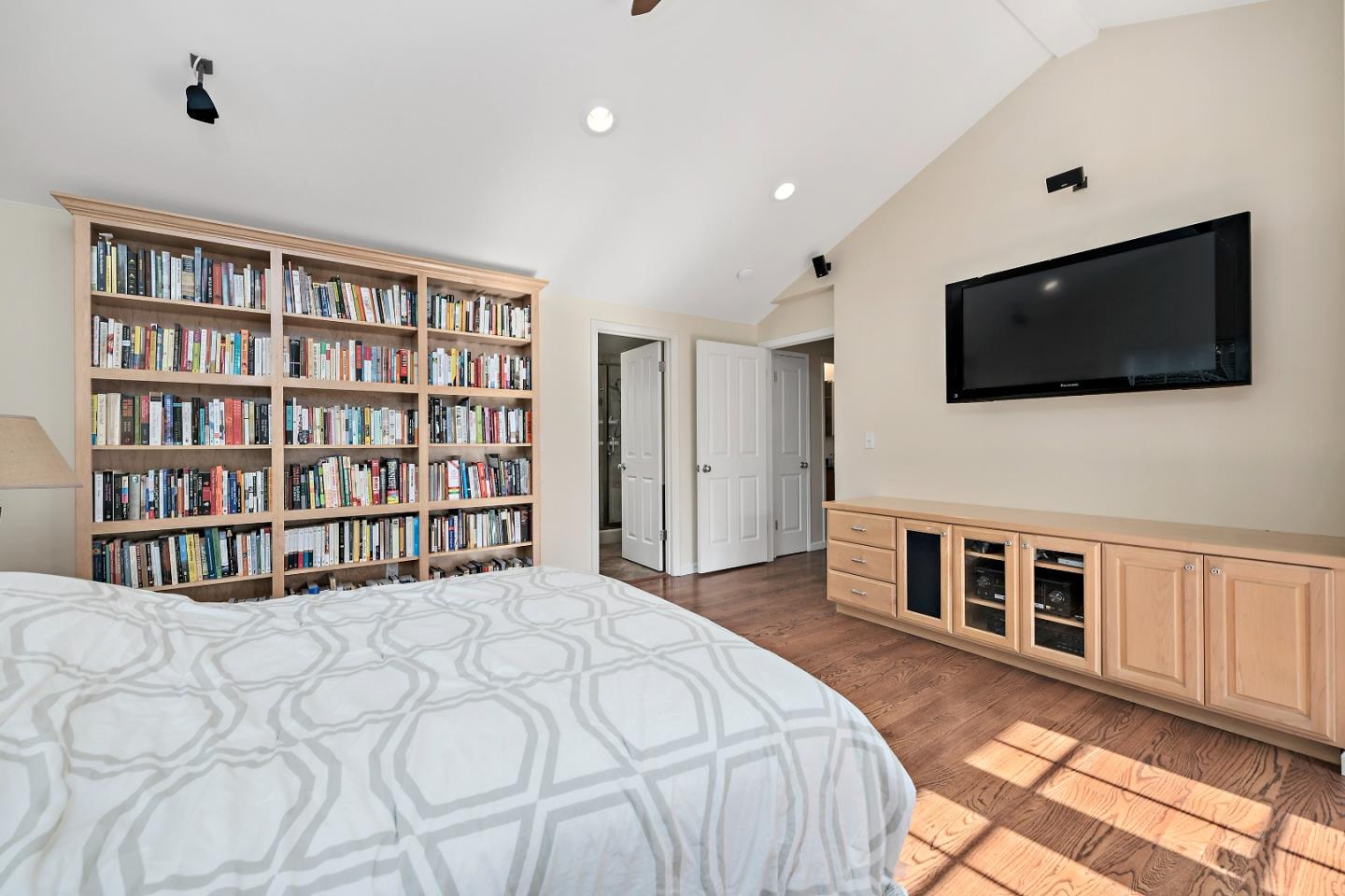 1019 Mango Avenue Sunnyvale, CA 94087 - Photo 13 of 17 a spacious bedroom with a bed and a flat screen tv