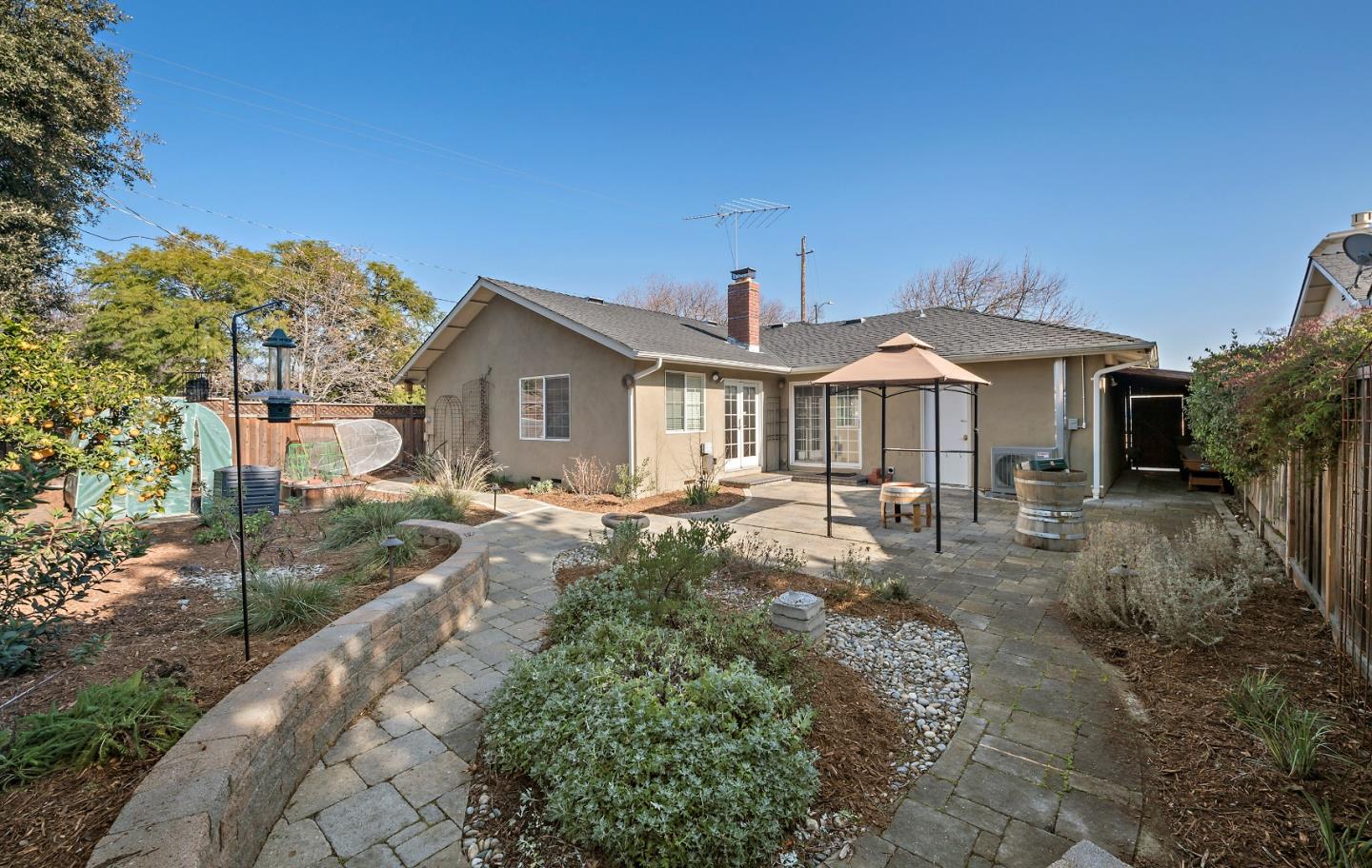 1019 Mango Avenue Sunnyvale, CA 94087 - Photo 17 of 17 a front view of a house with garden