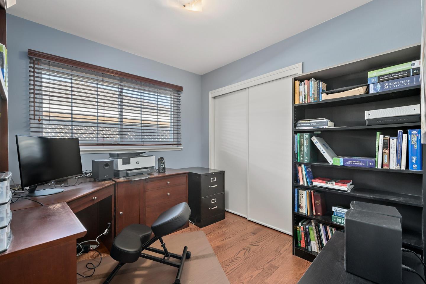 1019 Mango Avenue Sunnyvale, CA 94087 - Photo 10 of 17 a view of a workspace with furniture and a bookshelf