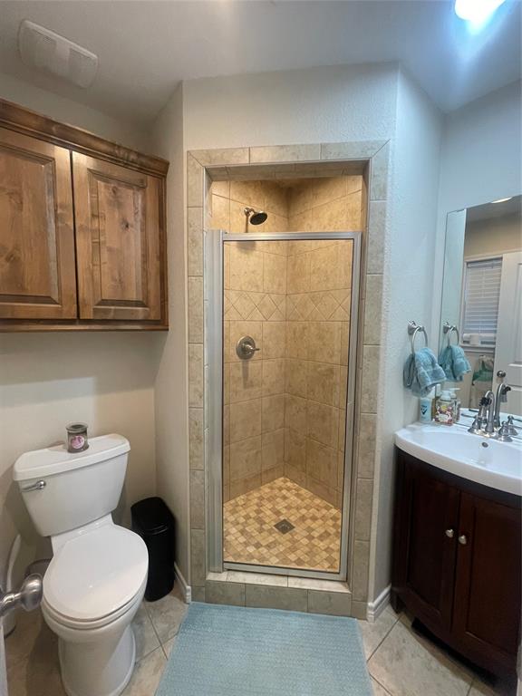 584 Highway 16 Graham, TX 76450 - Photo 15 of 22 a bathroom with a sink a toilet and shower