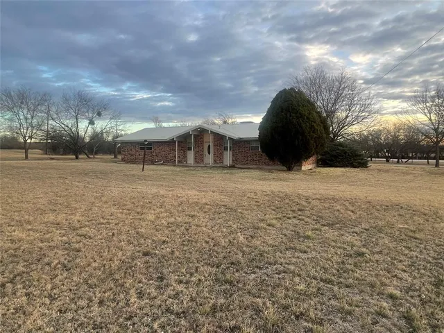 a view of patio and yard