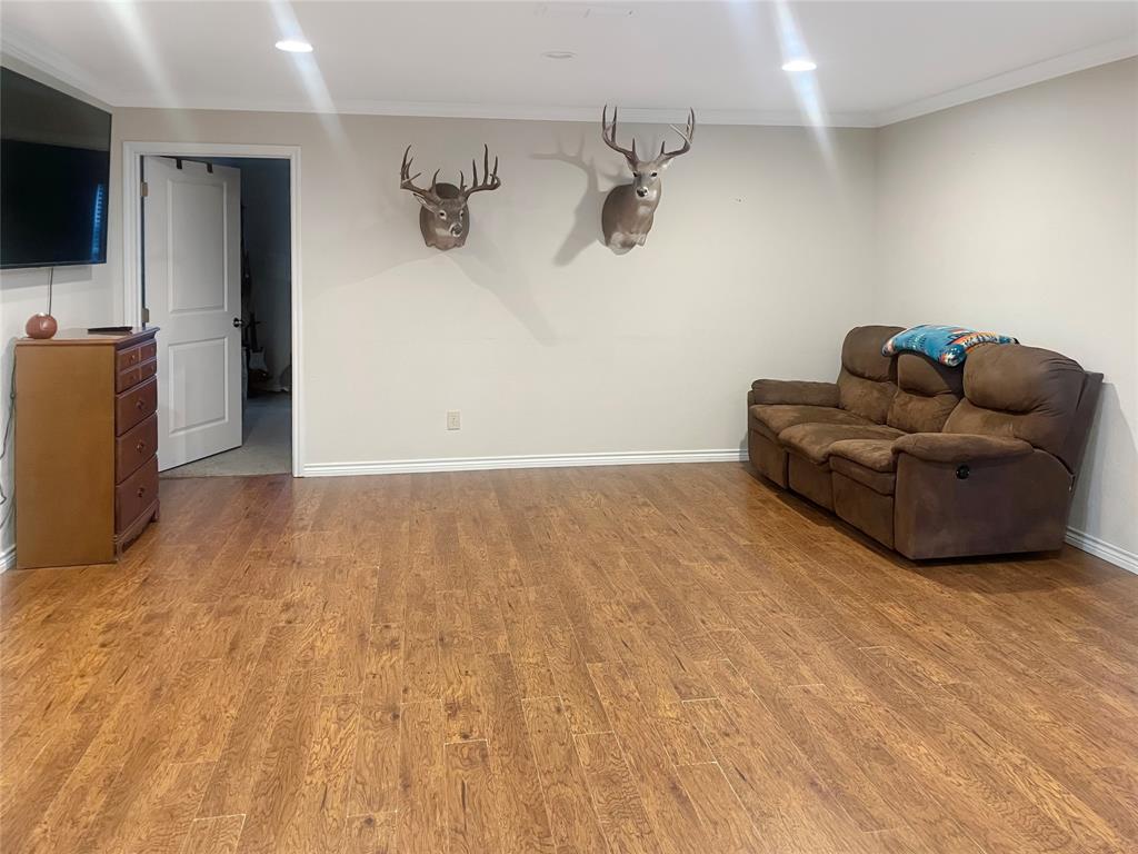 584 Highway 16 Graham, TX 76450 - Photo 4 of 22 a living room with furniture and a flat screen tv