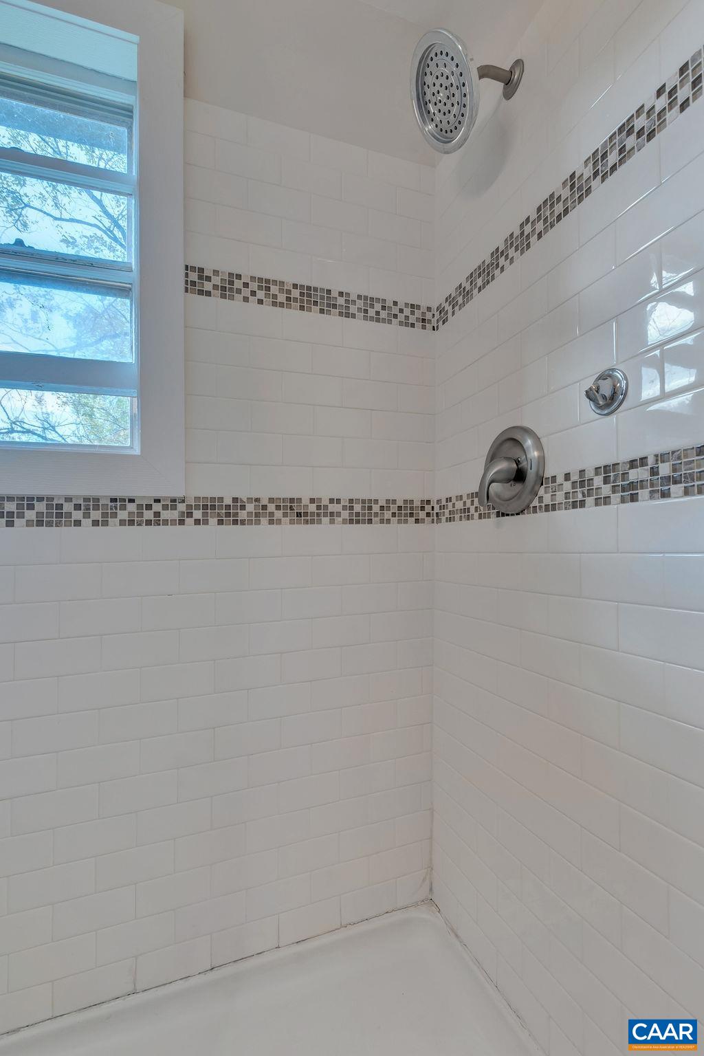 301 Georgetown Lane Charlottesville, VA 22901 - Photo 14 of 39 a close view of a shower in a bathroom